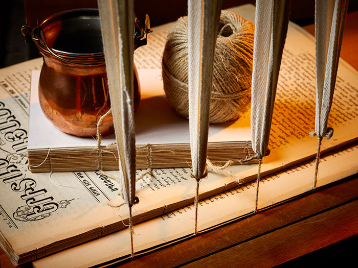 Sewing and Gluing the Spine of the Book